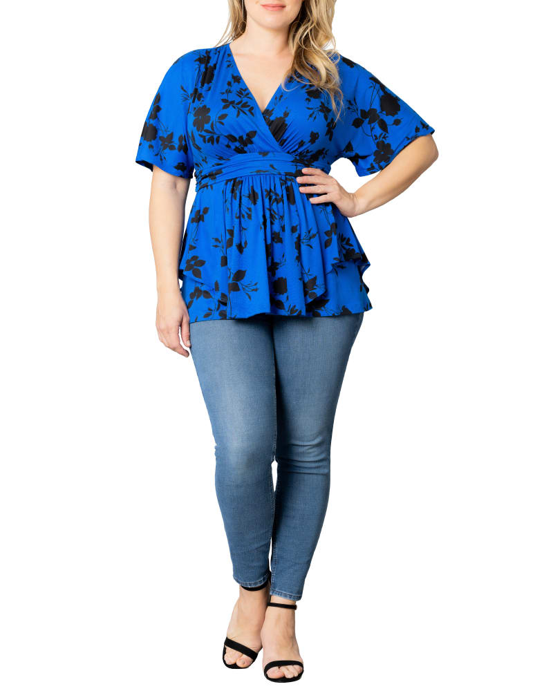 Front of a model wearing a size 2X Encore Print Top in BLUE FLORAL IMPRESSIONS by Kiyonna. | dia_product_style_image_id:294538